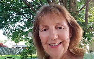 A smiling Anita Nickel outdoors
